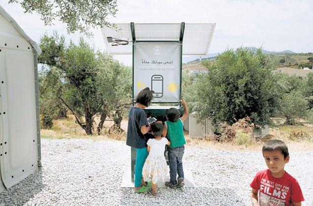 Solar Smartphone Charging Stations Providing Free Electricity To Refugees In Greece
